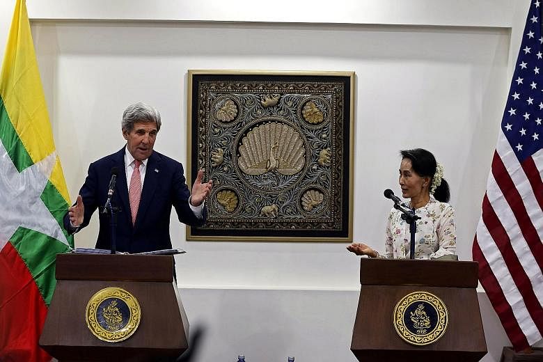 US Secretary of State John Kerry and Myanmar's Foreign Minister Aung San Suu Kyi at a news conference in Naypyitaw, Myanmar, yesterday.