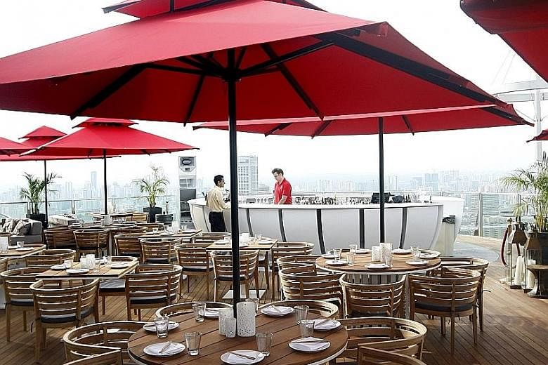 The former Ku De Ta club - now called Ce La Vi - located on the 57th floor of Marina Bay Sands. Mr Au is suing four former business partners and L Capital, the investment arm of LVMH, among others. He said his former business partners got the Hong Ko