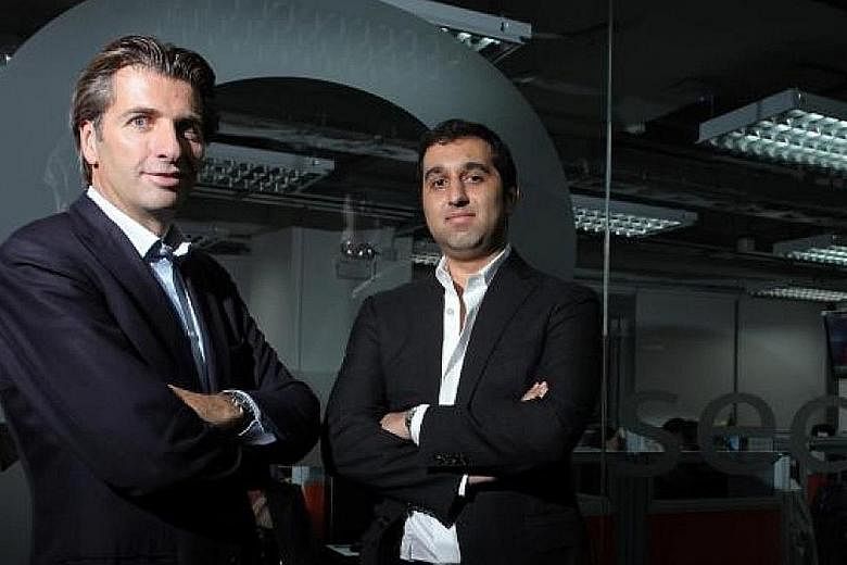 8 Securities chairman Mathias Helleu (left) and chief executive Mikaal Abdulla are aiming to expand into Australia, Indonesia, the Middle East, India and the US as well as Singapore. 8 Securities chairman Mathias Helleu (left) and chief executive Mik