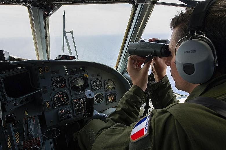 A French soldier searching for debris from the EgyptAir Flight MS804 aircraft over the Mediterranean Sea last week. Egypt has deployed a robot submarine and France has sent a search ship to hunt for the black boxes.