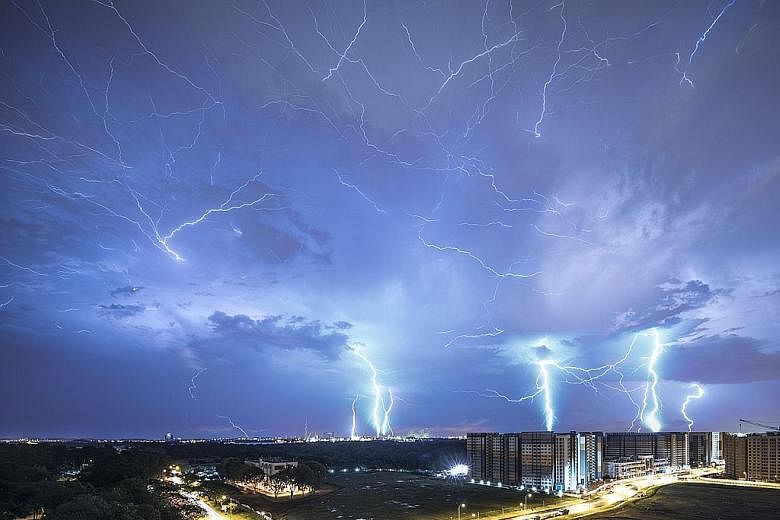 Mr Soh took about 100 images of lightning flashing across the night sky. He then selected 12 images and used Photoshop to layer them into a single composite image.