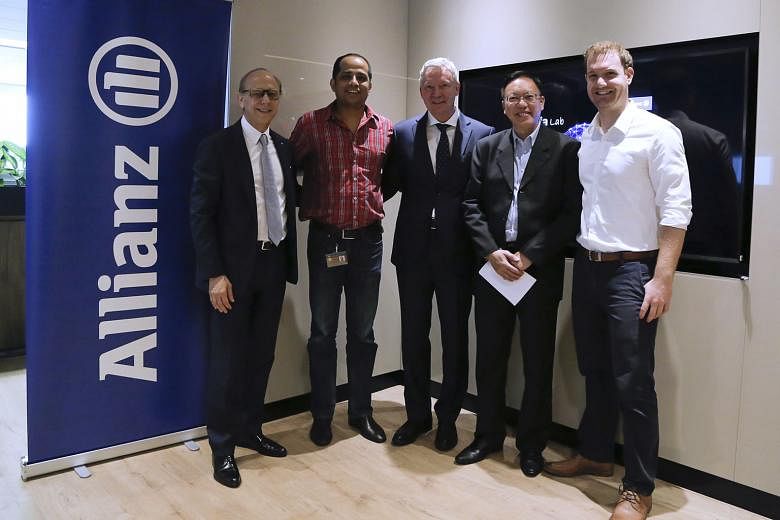At the Asia Lab launch were (from left) Allianz Asia Pacific chief executive Mr Sartorel, MAS chief fintech officer Mr Mohanty, Allianz Asia Pacific chief operating officer Ruediger Schaefer, Allianz Asia Pacific head of data science Raymond Au and Allian