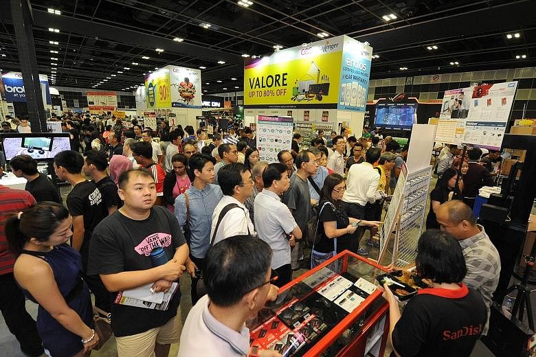 Thousands flocked to the Consumer Electronics Exhibition yesterday in search of a good deal on laptops, printers, smartphones, games and gaming hardware. Back for a second year, it is on at Halls 401 to 403, Suntec Singapore, until Sunday, from noon 