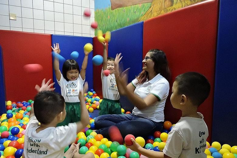 Kinderland @ Ministry of Manpower teacher Komalgeet Kaur Sandhu playing with some of her pupils. The pre-school was one of the centres that participated in the NTU psychology study in 2013.