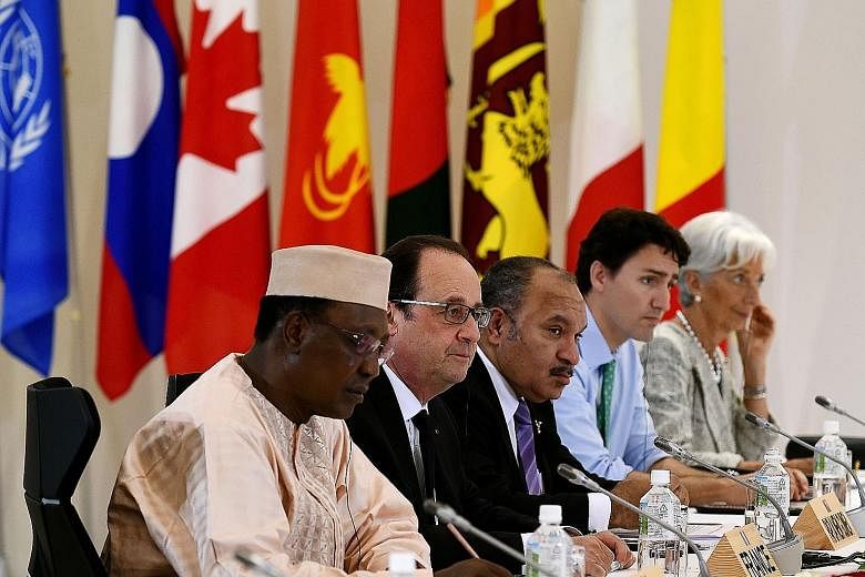 At the Outreach Session of the 2016 Ise-Shima G-7 summit in the city of Shima in Japan yesterday were (from left) Chad's President Idriss Deby, French President Francois Hollande, Papua New Guinea's Prime Minister Peter O'Neill, Canadian Prime Minist