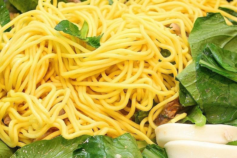 Lye is added to yellow noodles to prevent them from disintegrating when cooked in soup.
