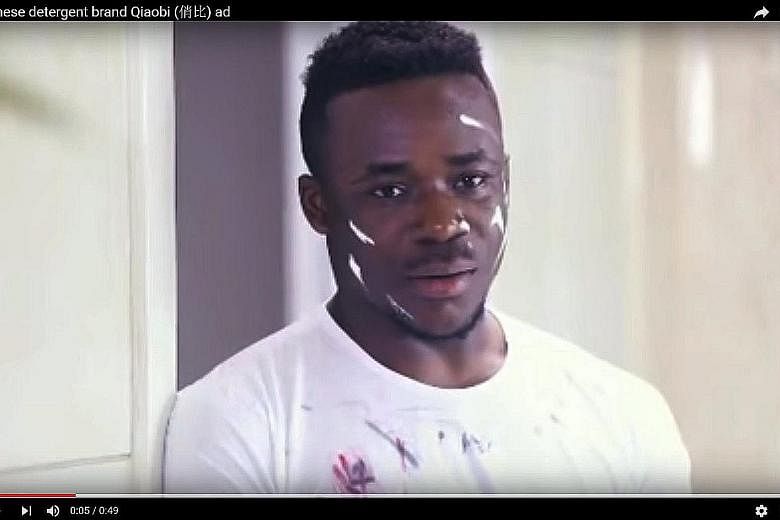 A screen grab of the commercial for the Qiaobi brand of detergent. The advertisement has provoked an uproar on US news websites, which cited it as an example of racist attitudes towards black people in China.