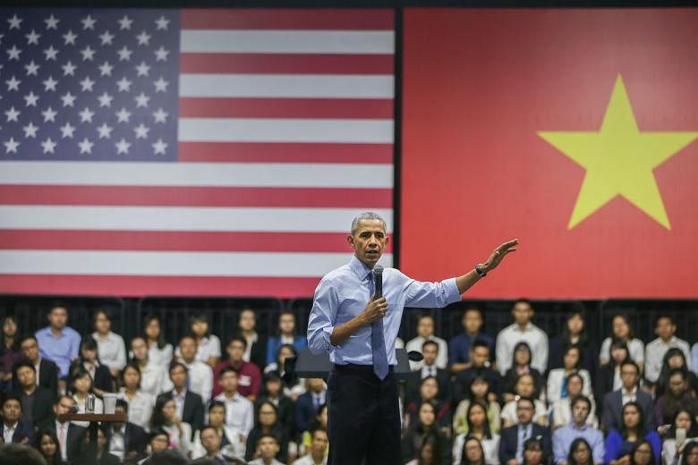Mr Obama addressing Vietnamese youth, members of the Young South-east Asian Leaders Initiative programme, at the GEM Centre in Ho Chi Minh City, Vietnam, on Wednesday. This is Mr Obama's first visit to Vietnam. He is the third US President to visit the So