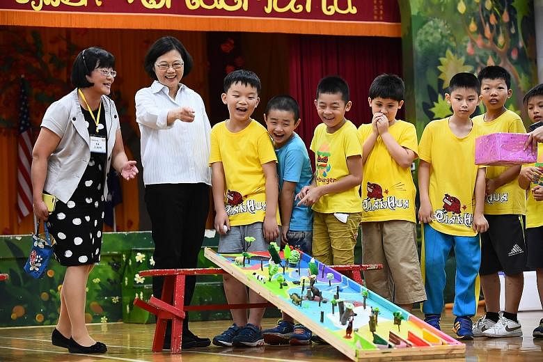 Ms Tsai Ing-wen (second from left) meeting students in New Taipei City last week. She was inaugurated as Taiwan's fourth elected president on May 20.