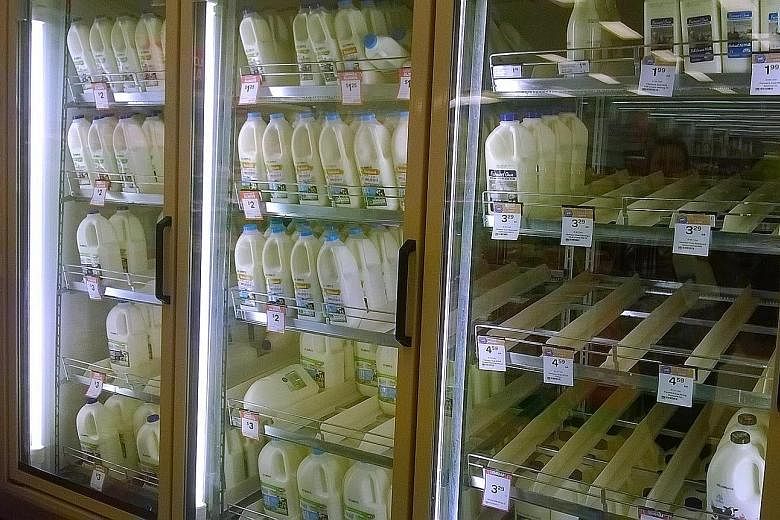 Photos on social media show sold-out shelves of milk produced by farmers next to cheaper house-brand milk. Australians have boycott the latter, which has been blamed for driving prices down.