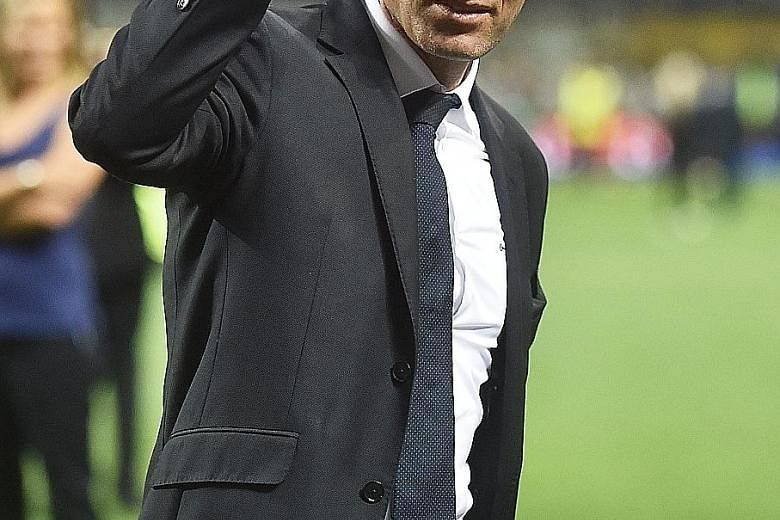 Real manager Zinedine Zidane (above) and Atletico boss Diego Simeone show contrasting emotions after the final whistle at the San Siro in Milan.
