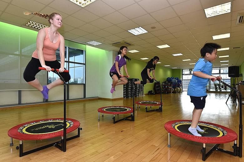 Participants trying out Boogie Bounce Xtreme. This aerobic workout on mini trampolines is among the new activities being offered by ActiveSG next month.