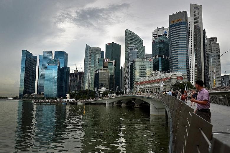 Skyline of Singapore showing the Marina Bay financial district and the Central Business District. Financial services, one of the key engines of growth and jobs, turned in a weak growth performance in the first quarter, falling 15.2 per cent from the 