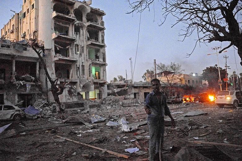 The site of the deadly attack on the Hotel Ambassador in central Mogadishu on Wednesday. Militant group Al-Shabaab claimed responsibility, saying one fighter drove a car that rammed the hotel while others stormed the building.