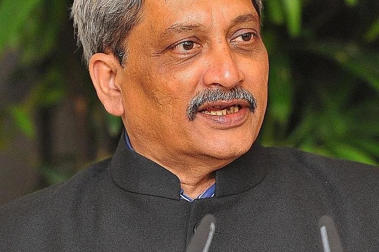 Mr Parrikar (above) and Dr Ng met at the inaugural Singapore-India Defence Ministers' Dialogue yesterday.