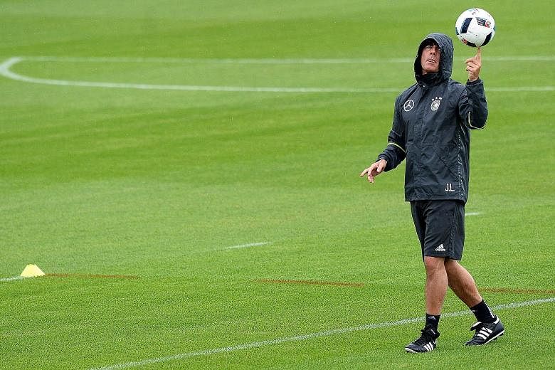 From left: When it rains, it pours for Germany coach Joachim Low. He lost key midfielders Ilkay Gundogan and Marco Reus to injury. Spain coach Vincente del Bosque is blessed with options in the centre of the park, but is light up front. France coach 