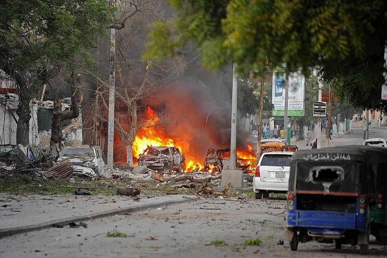 The aftermath of a terror attack on a top Mogadishu hotel by Somalia's Al-Qaeda- linked Shabaab this week.