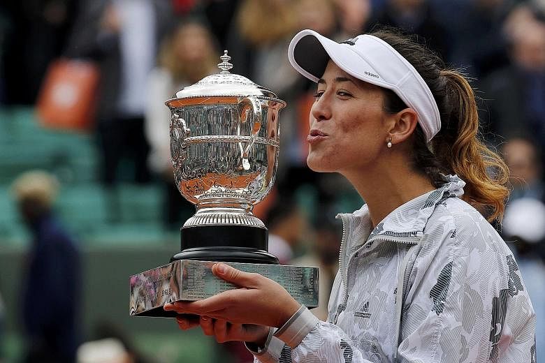 Fourth seed Garbine Muguruza shows her delight at beating top seed Serena Williams 7-5, 6-4 in the French Open final yesterday. The American was denied a chance to equal Steffi Graf's mark of 22 Grand Slam singles titles.