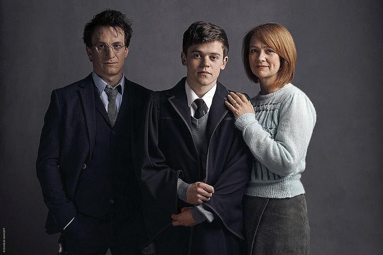 A grown-up Harry Potter played by Jamie Parker (far left), with Sam Clemmett and Poppy Miller as his son and wife in Harry Potter And The Cursed Child.