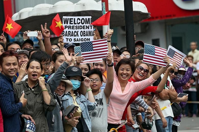 In a show of US soft power, people lined the streets of Hanoi and Ho Chi Minh City (above) to welcome Mr Obama last month.