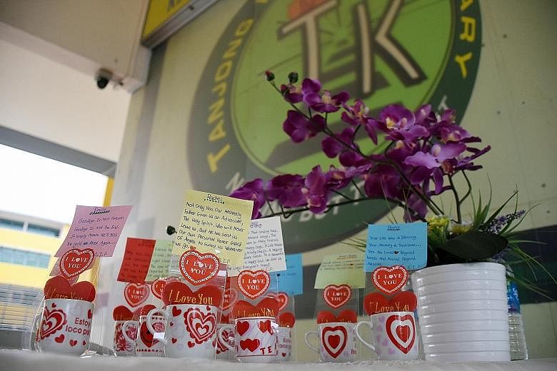 (Left) Messages penned by the sister of victim Navdeep Singh Jaryal Raj Kumar at Tanjong Katong Primary School, which held a memorial ceremony yesterday. (Above) A soccer event for another victim, Ameer, involving some 60 people, including his footba