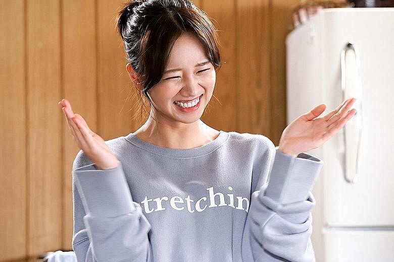 Lee Hyeri plays the eager manager of a rookie band in K-drama Entertainer.