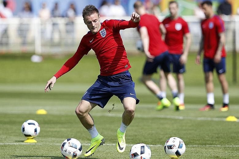 Jamie Vardy training at England's Euro headquarters in Chantilly's Bourgognes Stadium. Arsenal triggered the release clause in his contract and want to take the striker, who scored 24 league goals last season, to the Emirates Stadium.