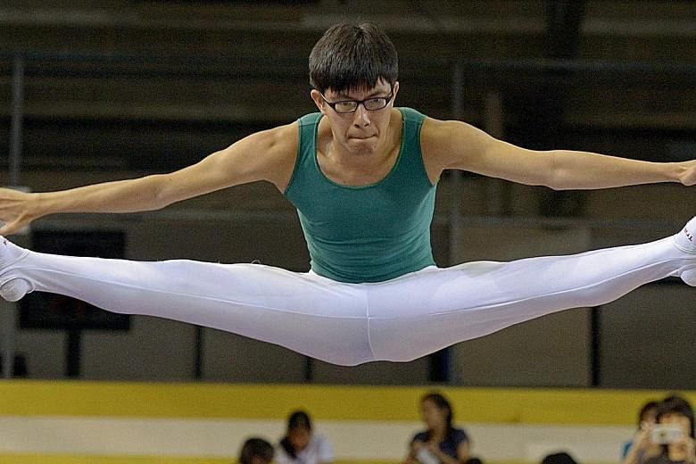Former RI gymnast Lee Kern Choong in action yesterday at the Singapore Open Gymnastics Championship.
