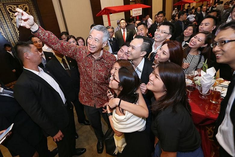 PM Lee at a reception yesterday with Singaporeans working in Yangon, held at Sedona Hotel, which is built by Singapore developer Keppel Land. The Singaporean community in Myanmar has grown from 150 a decade ago to at least 500 now. And the number loo