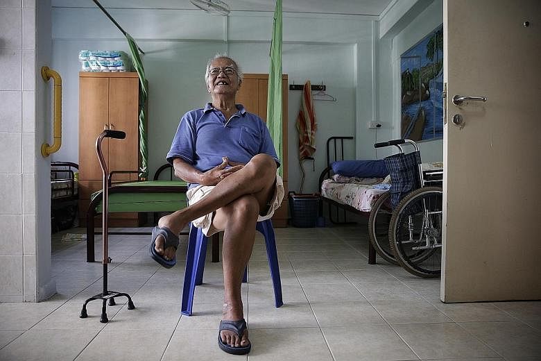 Mr Kang, a retired odd-job labourer, in the one-room flat which he shares with a flatmate at the Pecco senior group home. He moved to the home about a year ago after living in two dormitory- style homes for the elderly for about 10 years.