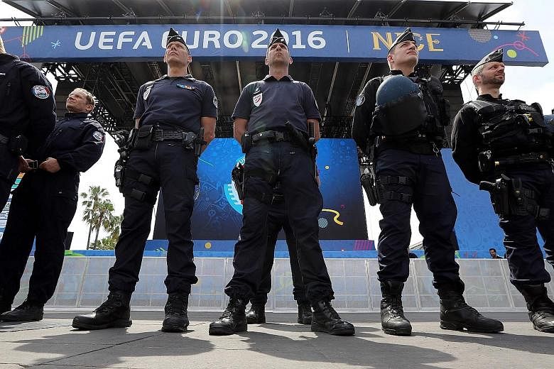 French police standing guard at a fan zone in Nice, France, on Wednesday. The country is on heightened alert for terrorist attacks during the Euro 2016 football championships taking place from today (local time) to July 10.
