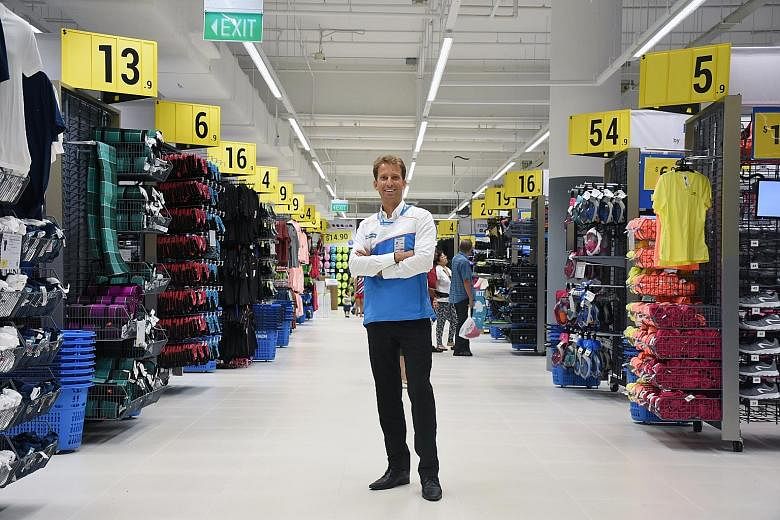 Bastien Grandgeorge, CEO of Decathlon Singapore, standing in his 21,500 sq ft City Square Mall outlet.