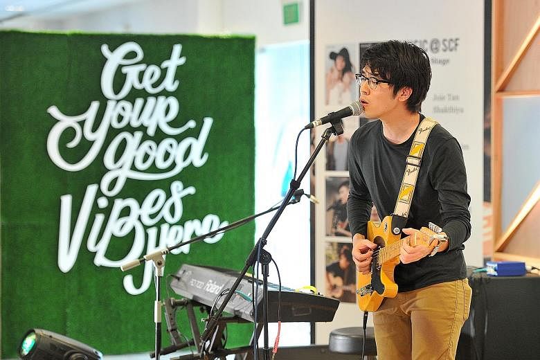 Charlie Lim performing at the Singapore Coffee Festival yesterday. Taking the stage today are other local acts like Jawn and iNCH.