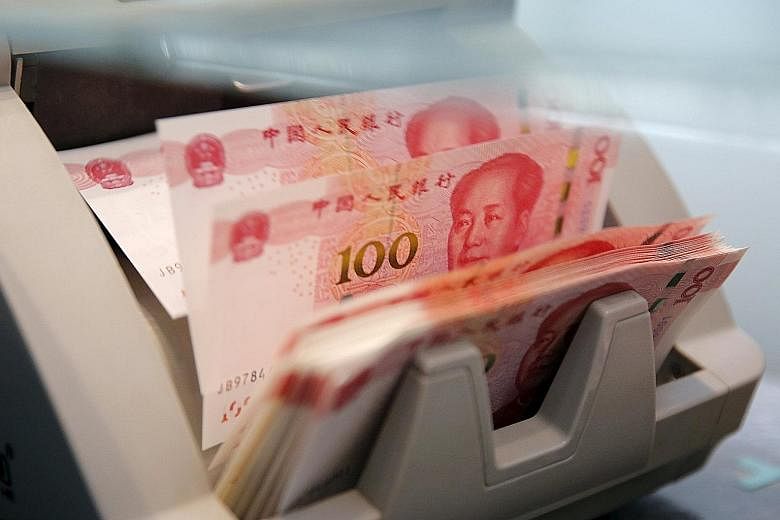 HSBC Singapore's senior vice-president Mr Hiranandani says demand for the yuan (above) is likely to increase when it gets easier for US companies and investors to transact in the currency. More contracts globally will be settled in yuan, which, in tu