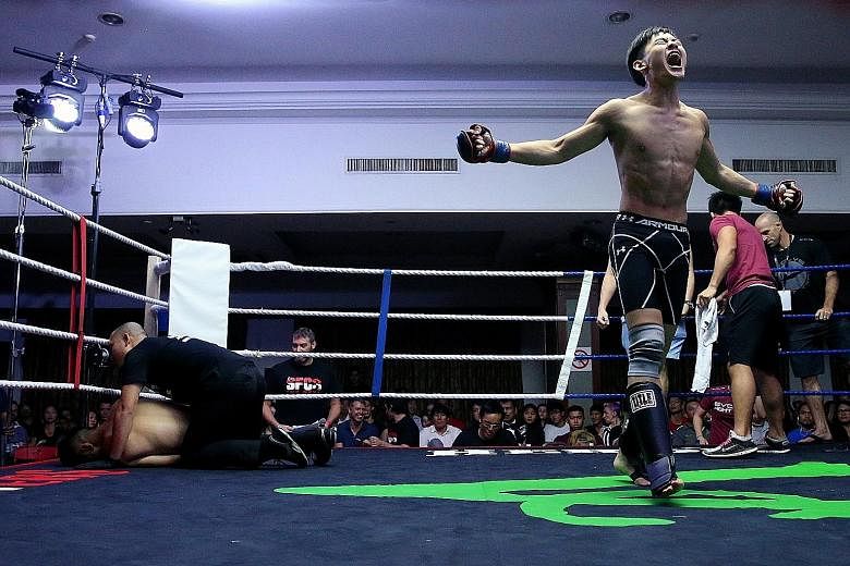 Lim Zhen Teng of Evolve MMA letting out a triumphant cry after beating fellow Singaporean Alvin Ang of Impact MMA in the amateur flyweight bout in one of the undercards at the Singapore Fighting Championship 3 event last night. The main event on the 