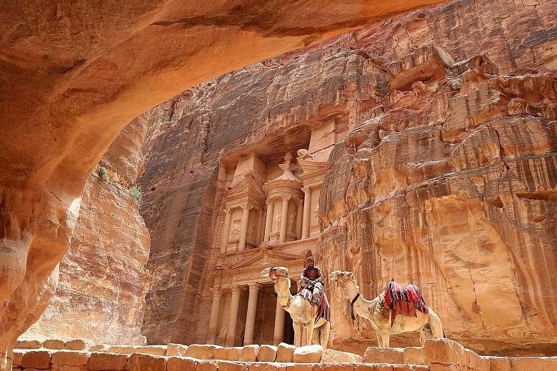 The Treasury Building in the ancient city of Petra in Jordan. Petra was built while the Nabatean civilisation was amassing great wealth through trading with its Greek and Persian contemporaries around 150BC.