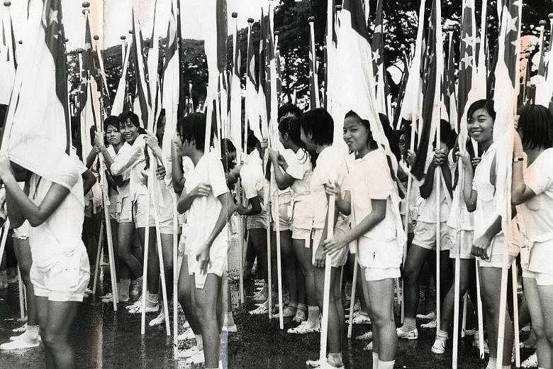 Were you part of this group of schoolgirls from the 1968 National Day Parade's youth contingent, or have you participated in any of the other parades? We want to hear your story for this year's National Day supplement. Send an e-mail to stndpstories@