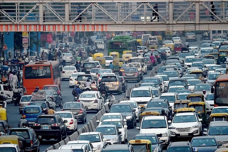 Nations like India, whose cities are beset by slums, yearn for a prosperous urban future. But getting there will require major governance and policy changes. This is because their cities, such as India's New Delhi (above), are places where traffic cr