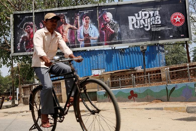 A poster of the Bollywood film Udta Punjab in Mumbai.