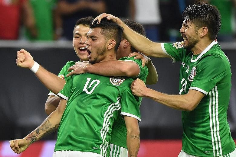 Mexico's Jesus Manuel Corona (No. 10) celebrating with team-mates after his dazzling equaliser against Venezuela in a Copa America game in Houston on Monday.