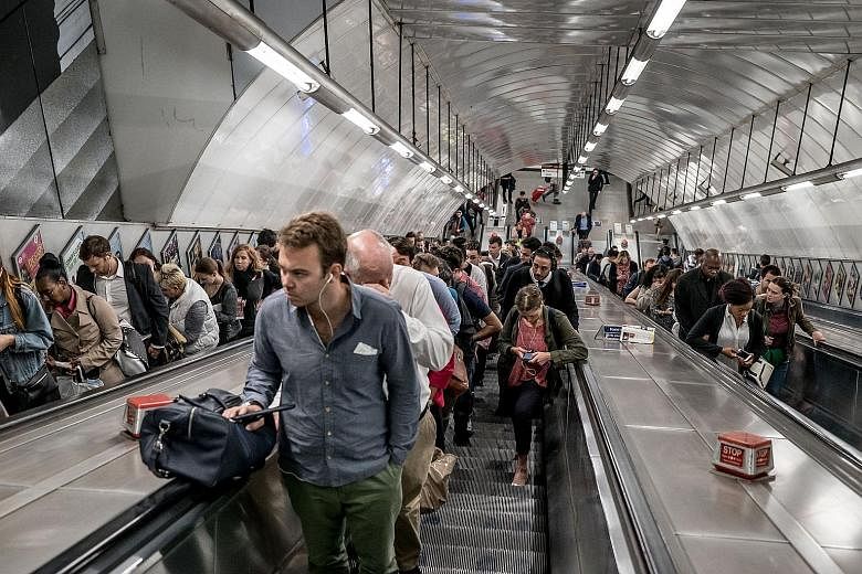 The evening rush hour last Thursday at the busy Holborn station. During peak periods, the station ditches the convention of leaving one side of the escalator clear for people to walk up.