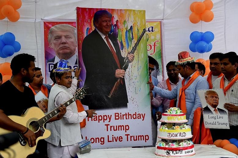 Republican presidential candidate Donald Trump's fame has spread to India, where his supporters celebrated his 70th birthday yesterday. The celebration in the Indian capital, New Delhi, was organised by a little-known right-wing group Hindu Sena, whi