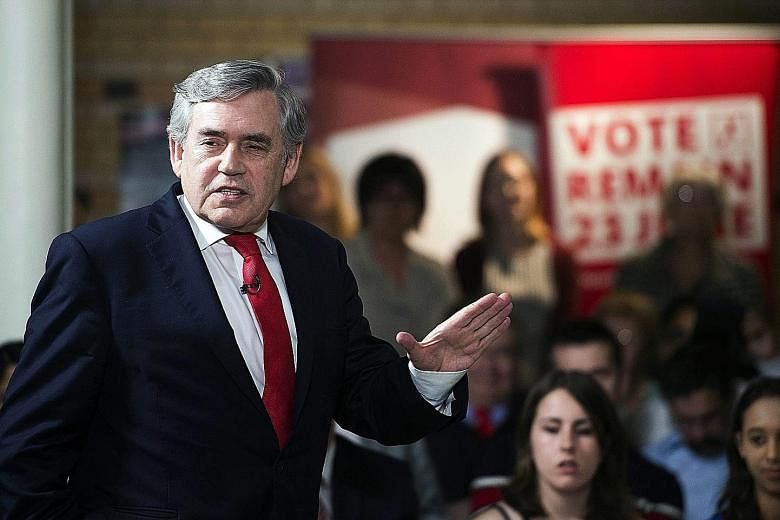 Top: An advertisement in Vauxhall, London, campaigning for Britain to leave the European Union. Above: Former prime minister Gordon Brown at a 'Remain'' event in Leicester on Monday. He made an impassioned plea to Labour voters not to turn their back