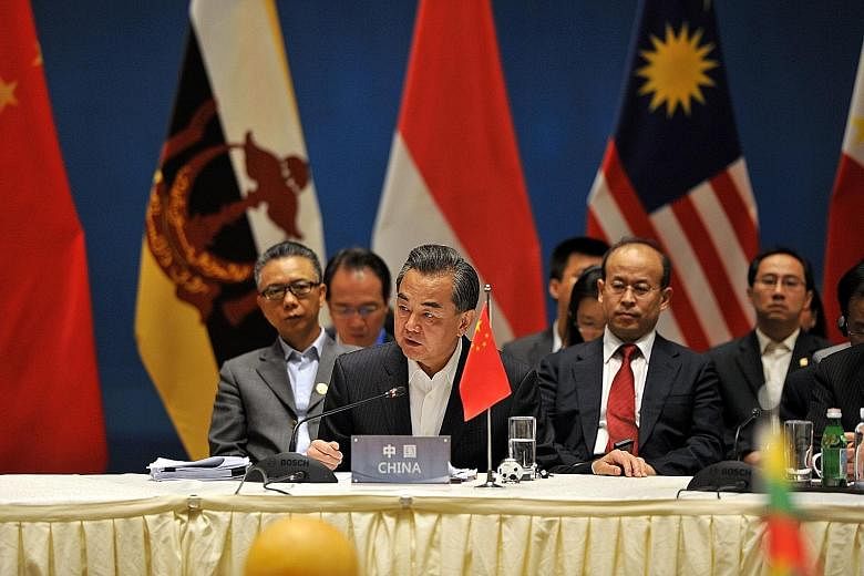 Chinese Foreign Minister Wang Yi and foreign ministers from Asean member states at a special meeting in Kunming on Tuesday. The South China Sea territorial disputes took centre stage during the meeting, with the two sides airing their differences.