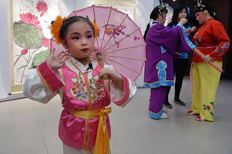 Four-year-old Wee-Ann will be performing in a Chinese opera with her grandmother and mother in the upcoming PAssionArts Festival.