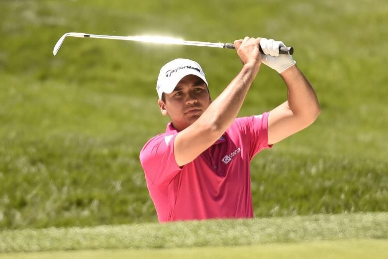 World No. 1 Jason Day hitting a bunker shot during the US Open practice round. Together with Rory McIlroy and Jordan Spieth, the other members of golf's "Big Three", the Australian will be leading the field for the US Open, which is making its return at O