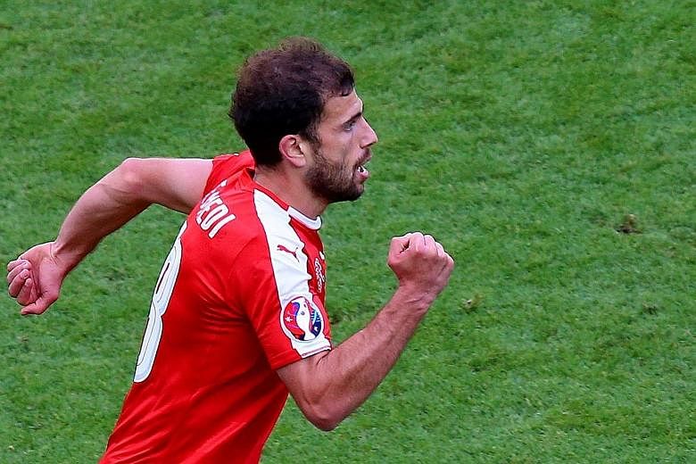 Admir Mehmedi's equaliser against Romania put the Swiss on the brink of reaching the European Championship's knockout stages for the first time.