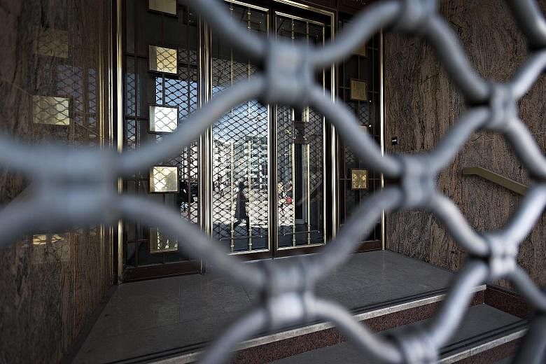 The locked entrance of Lloyds Banking Group's former offices is a reminder that some of the biggest names in global finance have quit Geneva.