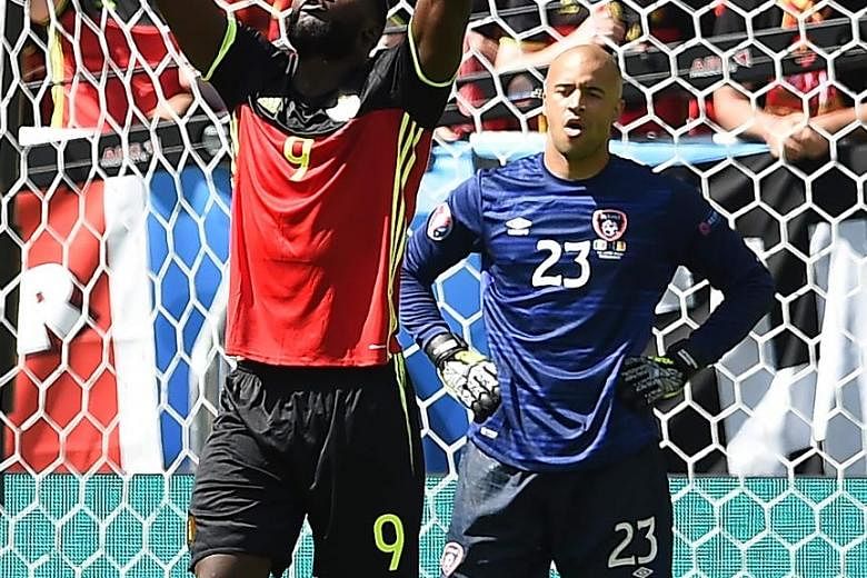 Romelu Lukaku celebrating his second and Belgium's third goal in the 3-0 disposal of Ireland as Irish goalkeeper Darren Randolph can only look on, with his side's chances of staying in the competition slim after this defeat. For Belgium's golden gene