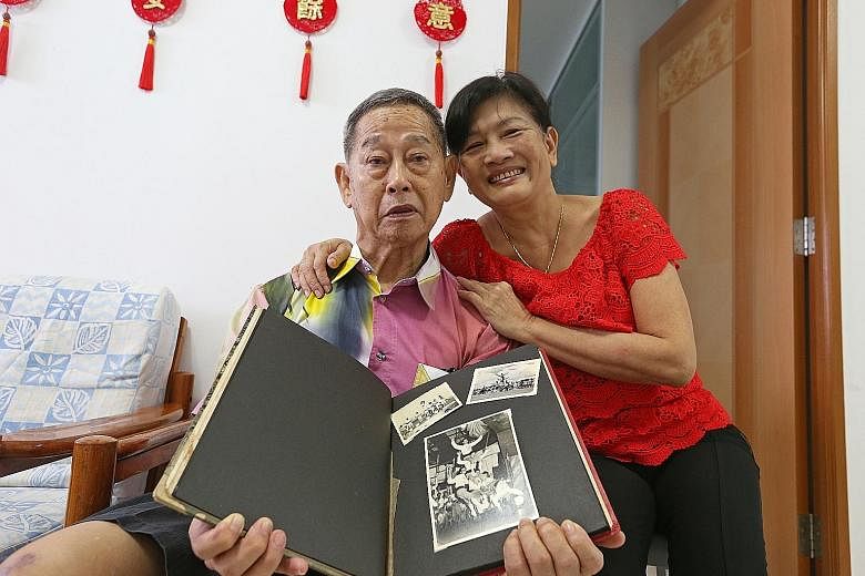 Mr Chia (left), with his wife Madam Ong, shows off his prized photo album containing pictures of his time with the Kong Chow Clan Acrobatic Cycling Troupe (far left). The pictures will be uploaded onto NHB's roots.sg portal - a website on Singapore's